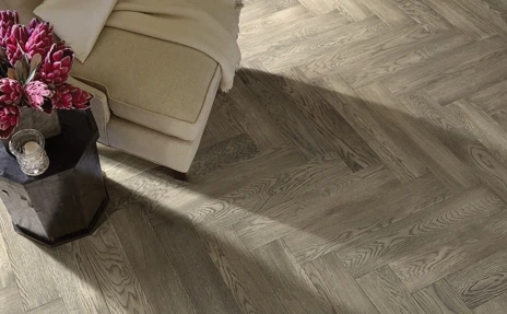 Grey herringbone hardwood floors