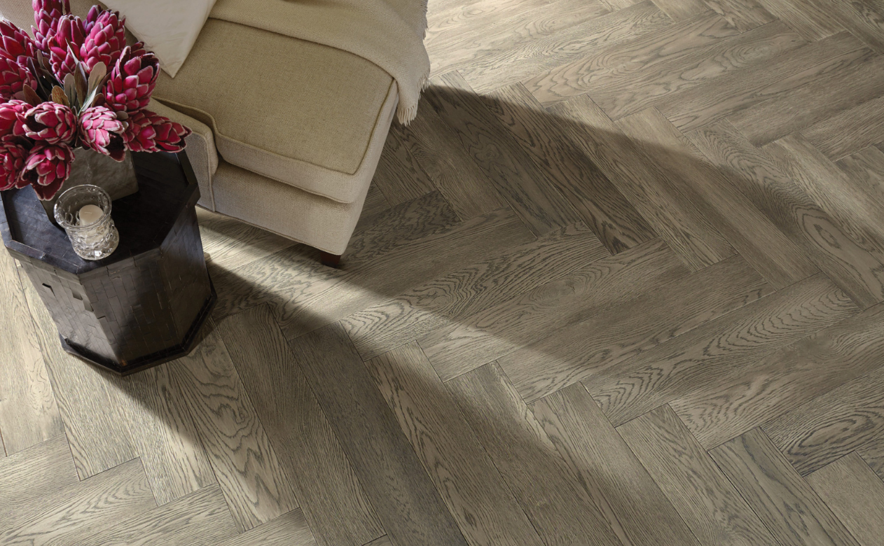 Grey herringbone hardwood floors