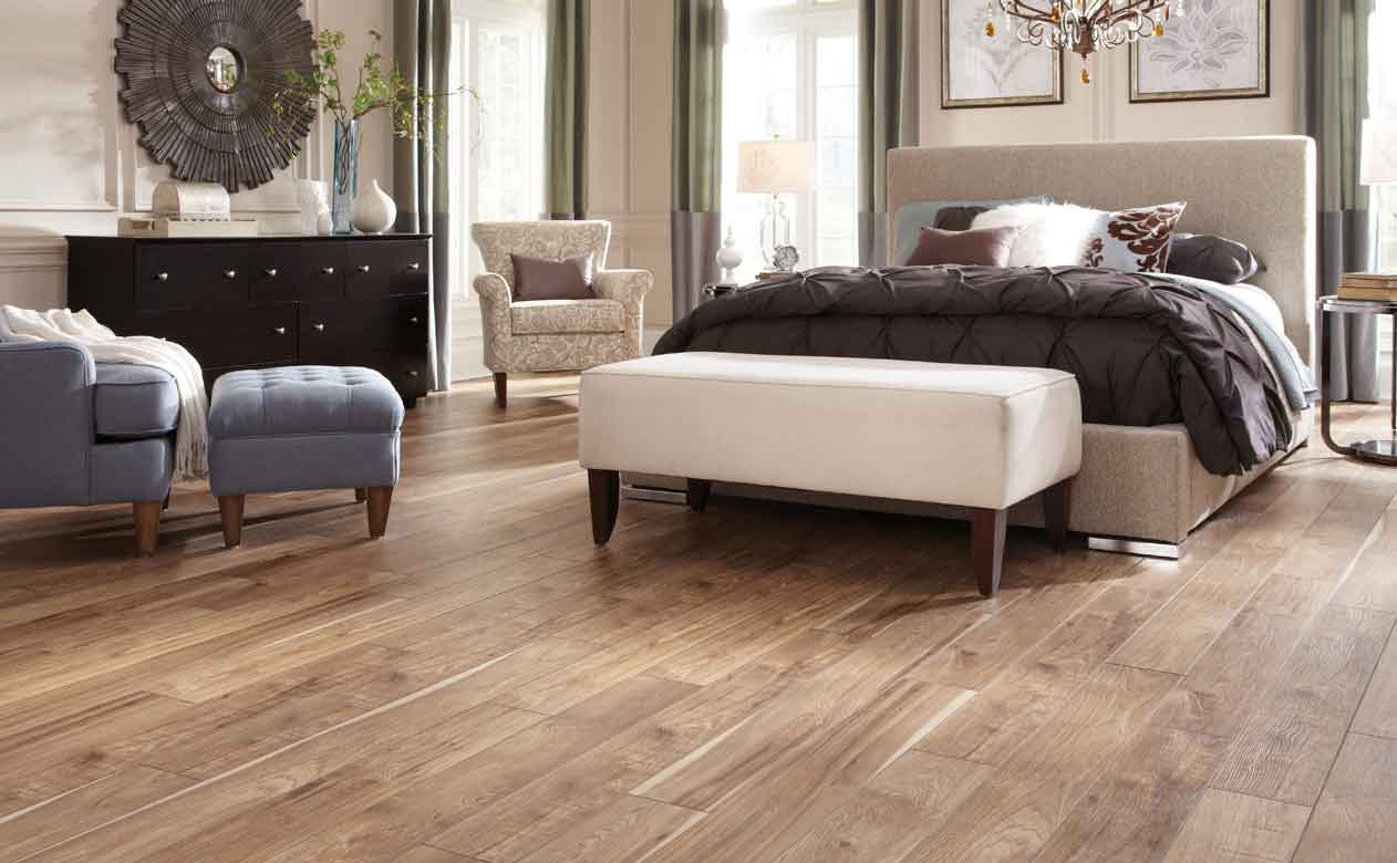 wood-look tile flooring in a bedroom